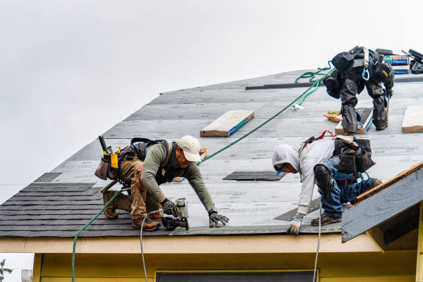 Professional Roofing technician working in Freeport, ME